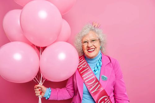 Old woman celebrating birthday