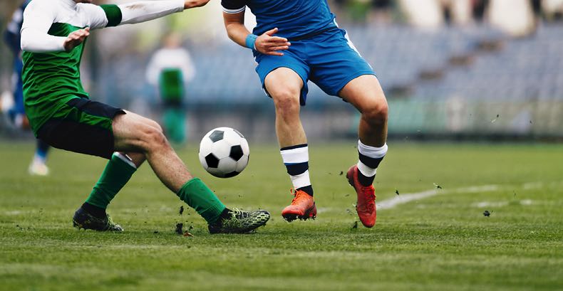 Men playing football