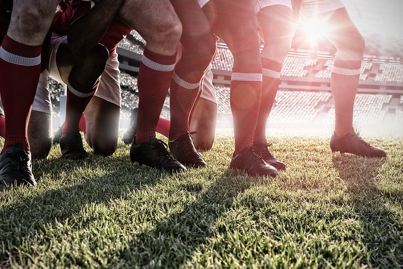 Legs of Rugby Players in Scrum
