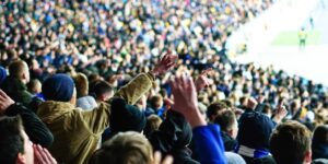 Football Fans in Crowd Cheering