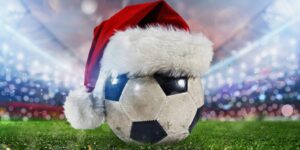 Football with Christmas Hat in Stadium
